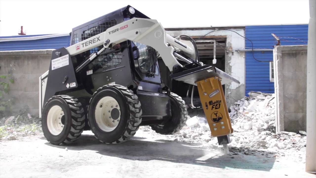 Мини-погрузчик Terex TSR 50 с гидромолотом Delta F4